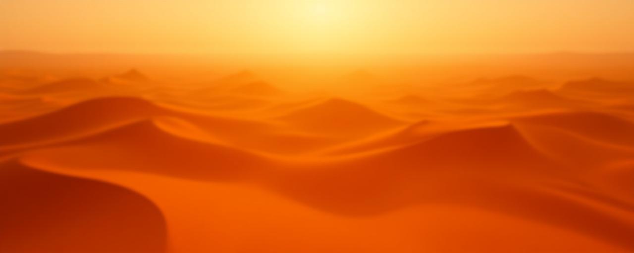 Vast golden sand dunes at sunset